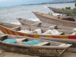Fishing boats filled with bed nets line Lake Tanganyika