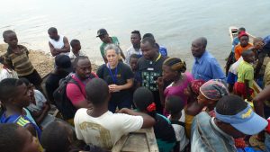 Amy and Anderson speak to fishermen on Lake Tanganyika about local fishing practices